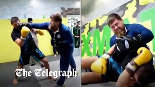 Chechen dictator Kadyrov filmed sparring against UFC fighter in bizarre video [upl. by Vareck]