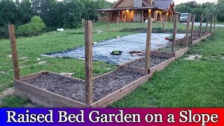 Building Raised Beds down a slope  Fenced in Garden Area  Part 3 [upl. by Yaner]