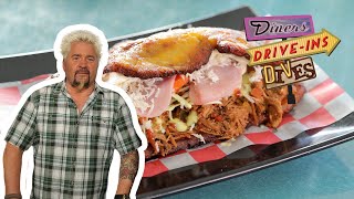 Guy Fieri Eats a Patacon Beef Sandwich  Diners DriveIns and Dives  Food Network [upl. by Mead]