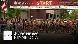 Runners hail cooler weather for Twin Cities Marathon [upl. by Uzial]