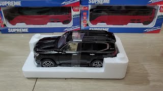 Unboxing Of Toyota Land Cruiser LC300 Twin Turbo GXR 124 scale diecast model car [upl. by Aerdnaek]