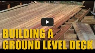 Build a Ground Level Cedar Deck [upl. by Nemraciram]