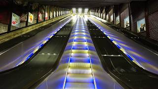 Sweden Stockholm Tekniska Högskolan subway station rainbow escalator  going up to street level [upl. by Einnahpets]