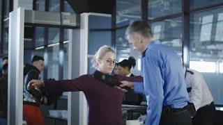 Airport Security Guard Checking Passenger Stock Video [upl. by Giffy38]