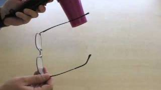 How to adjust the arms on glasses with metal frames [upl. by Fritzsche609]