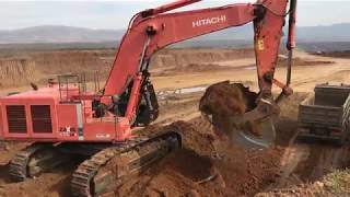 Hitachi Zaxis 670LC Excavator Loading Trucks With 3 Passes [upl. by Tlevesor649]