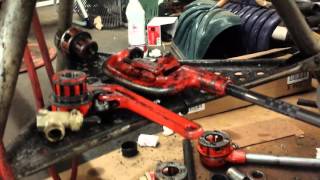 Using a Ridgid 300 tripod pipe threader [upl. by Nauj]