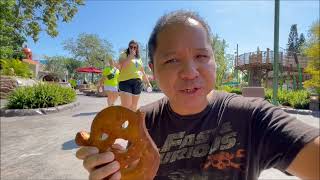 eating a Shrek Pretzel quotShrekzelquot at DreamWorks Land at Universal Studios [upl. by Ataner]