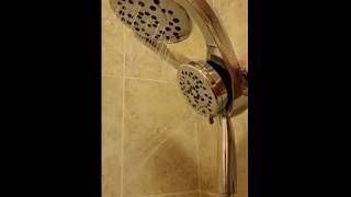 Delta HYDRORAIN 2IN1 4SPRAY DUAL SHOWERHEAD AND HANDHELD SHOWERHEAD WITH MAGNATITE IN CHROME [upl. by Miculek223]