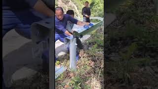 Hardworking workers installing corrugated sheet fence [upl. by Schenck619]