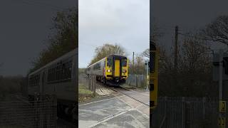 2 class 153s passing through crundale level crossing railway train shorts [upl. by Laurie]