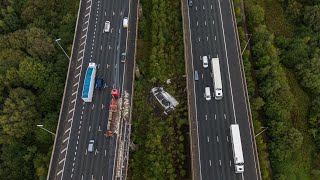 Shocking footage shows aftermath of lorry that plummeted off motorway bridge  SWNS [upl. by Aram488]