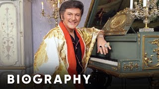 Liberace  Pianist amp Performer  Mini Bio  Biography [upl. by Hendon650]