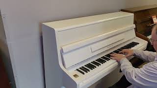 Used White Piano with a warranty [upl. by Eillom336]