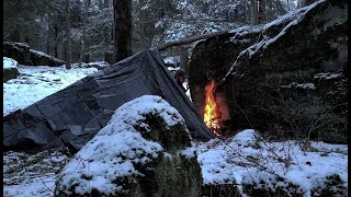 SOLO Winter Camping in Snow  Deep Woods Cheap TarpBig Rock Shelter Swedish Torch Cooking [upl. by Infeld]