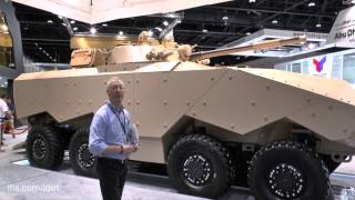 IDEX 2015 Christopher Foss talks about the Emirate Defense Technology Enigma 8x8 armoured combat veh [upl. by Magdaia]