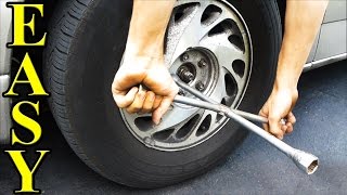 How to Change a Tire plus jacking it up [upl. by Schroth]