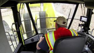 Meet the Pros 994K Cat® Large Wheel Loader Operator Cab [upl. by Essilevi5]