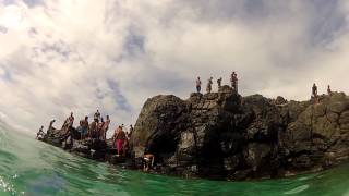 Waimea Bay North Shore  Cliff jumps and swimming under rock cave [upl. by Okramed]