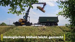 Mecalac 11MWRST5 GreenJob Mobilbagger mit Herder Mähkorb für das ökologische Mähen von Böschungen [upl. by Sibyls]