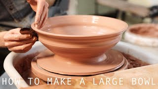 Throwing and Trimming a Large Indented Stoneware Bowl [upl. by Nomit]