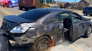 SEMI TRUCK SENDS CAR SPINNING IN CRASH CAUGHT ON DASH CAM [upl. by Paco]