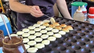 London Street Food Cooking Sweet Dutch Pancakes quotpoffertjesquot in Camden Lock Market [upl. by Cockburn]