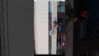 These guys climbed on top of tall building to install AC😱 shorts [upl. by Nana221]