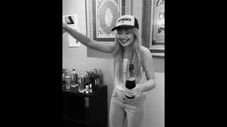 ￼ Sabrina Carpenter opening a champagne bottle ￼ [upl. by Guyon]