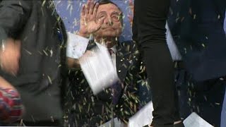 DRAGHI attacked by CONFETTI throwing FEMEN activist at ECB keynote speech [upl. by Namara]