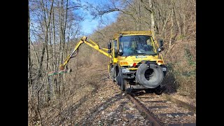 DE51674 Wiehl Wiehltalbahn Einsatz eines Zweiwege Unimogs für Freischneidearbeiten im Januar 2024 [upl. by Copeland758]