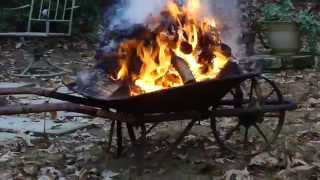 HOW TO BUILD A PORTABLE FIRE PIT  FROM ANTIQUE WHEEL BARREL MUST SEE WOW [upl. by Bergwall]