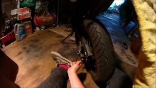 How to adjust a motorcycle chain [upl. by Auqenet538]