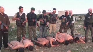 Does execution video prove Syrian rebels to be extremists [upl. by Ardnasella941]