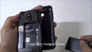 Nokia Lumia 620  Guide To Remove Back Cover Insert Sim Card and Apply Back Cover on Device [upl. by Anoirb]