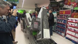 Black Friday shopping invades British stores [upl. by Cirted]