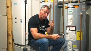 How do I adjust the temperature on my electric water heater  A master plumber explains [upl. by Iong]