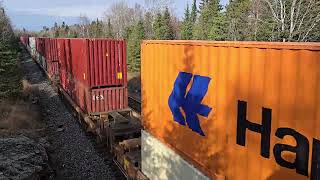 An SD70ACU leads eastbound CPKC intermodelmanifest 118 up the grade into Ingolf 11124 [upl. by Farica869]