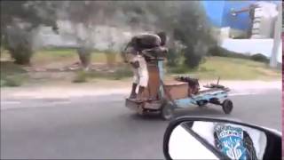 Only in JamaicaA motorized push cart speeding on the road [upl. by Bela]