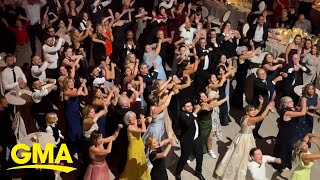 See the heartwarming moment wedding guests surprise bride with ABBAthemed flash mob [upl. by Pearla]