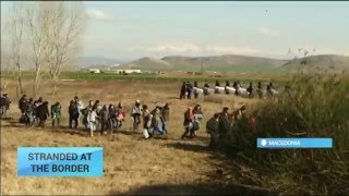 Refugees Stranded in Macedonia Hungary announces referendum on EU migrant quotas [upl. by Ahsela]