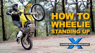 How to wheelie standing up on a dirt bike︱Cross Training Enduro [upl. by Ddart]