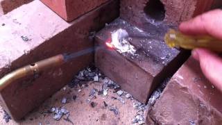 Melting aluminium cans with a propane torch [upl. by Alva158]