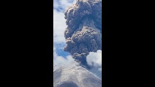 Indonesian volcano spews mountains of ash into the air [upl. by Yrffej]