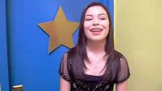 Miranda Cosgrove dishes on The Naked Brothers Band set [upl. by Eelarbed]