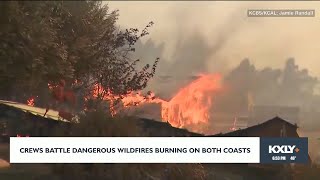 Crews battle dangerous wildfires on both coasts [upl. by Eelsnia]