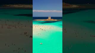 Il Gioiello Blu di Stintino quot La Pelosa dipinta di Blu quot  4K  Sardegna World [upl. by Gabbie]