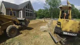 Building a boulder retaining wall [upl. by Kluge396]