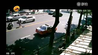 Scooter suddenly flips over throwing off driver and passengers and runs away itself [upl. by Liane287]