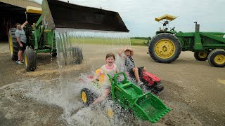 Using tractors to play with water  Tractors for kids [upl. by Rema]